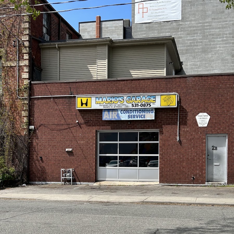 Mario's Garage exterior with signage on Fennings Street, Toronto